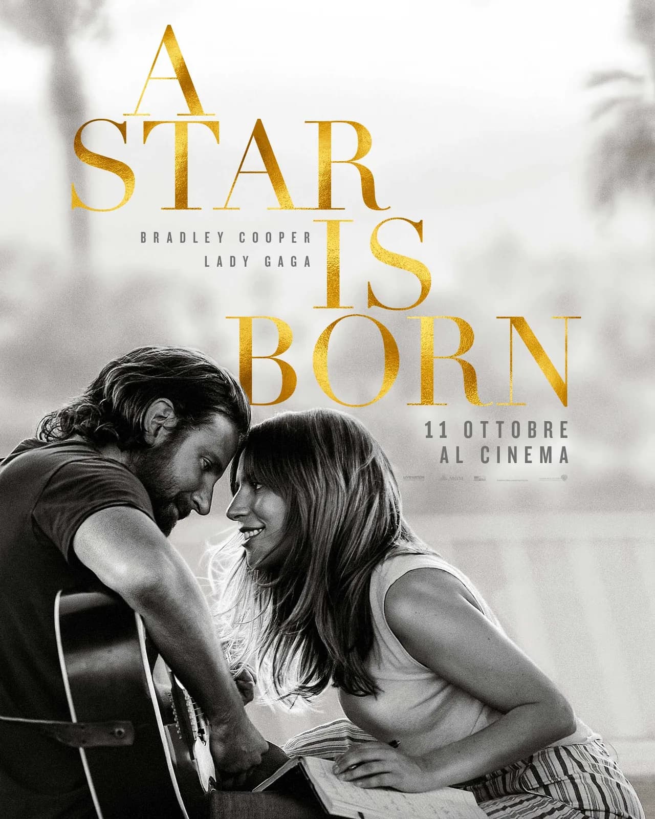 Official Italian poster showing Bradley Cooper and Lady Gaga together.