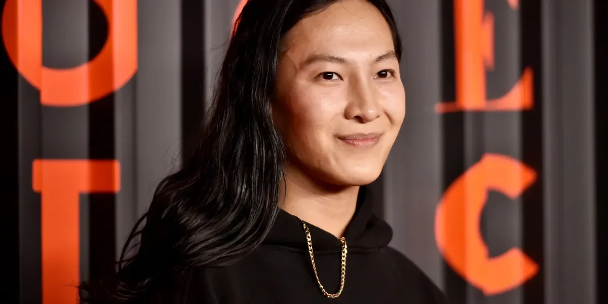 Designer Alexander Wang smiles at an event