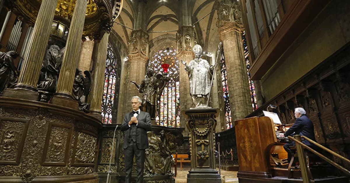 Italian tenor and global music icon Andrea Bocelli (right) gives a solo performance at the historic Duomo, the cathedral of Milan, Italy, by invitation of the city and of the cathedral and thanks to…