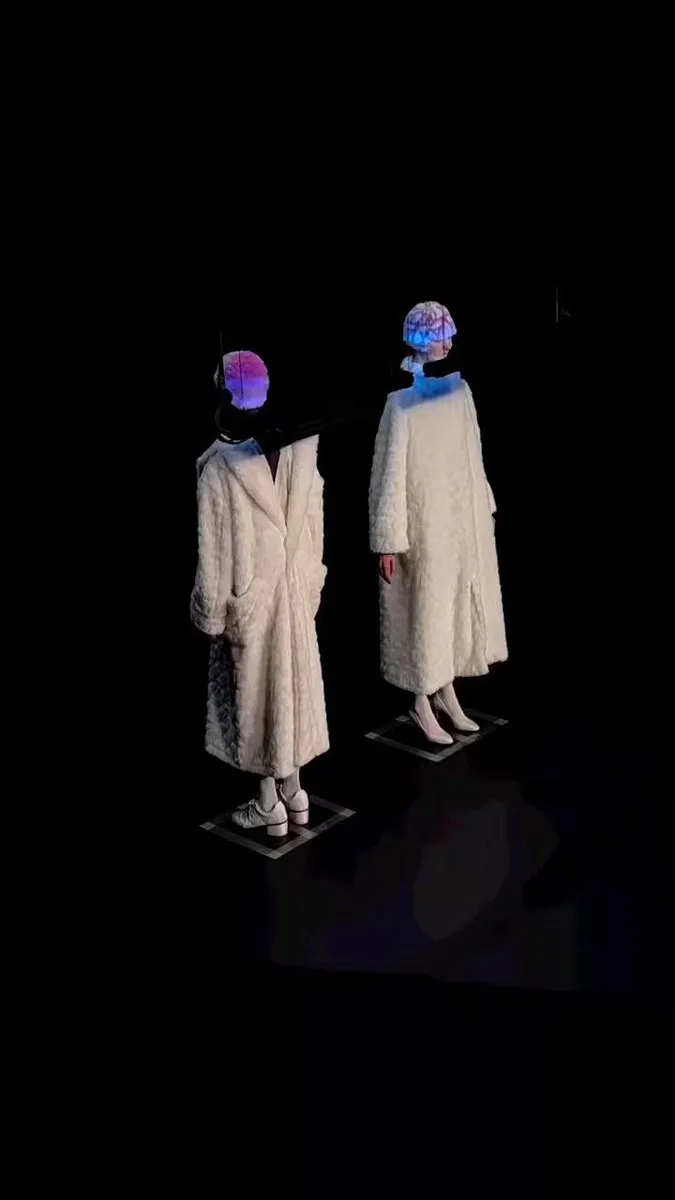 technology meets fashion at the anrealage fw23 rtw show with the use of uv light lamps that change the colors of clothes at paris fashion week today