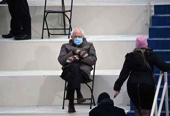 TOPSHOT - Former presidential candidate, Senator Bernie Sanders sits...