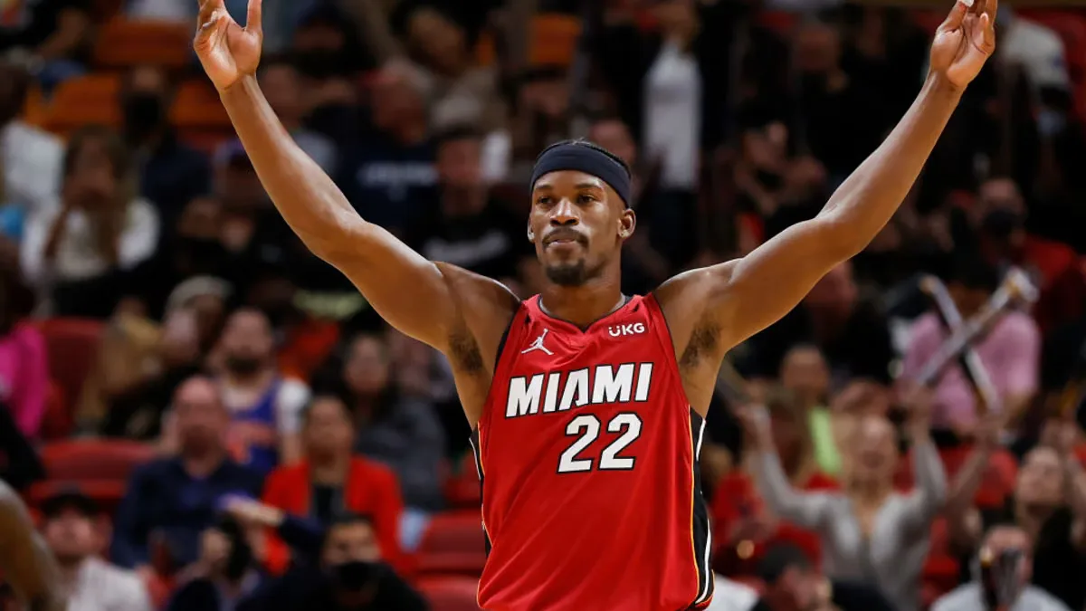 MIAMI, FLORIDA - JANUARY 26: Jimmy Butler #22 of the Miami Heat gestures to the crowd in the second half against the New York Knicks at FTX Arena on January 26, 2022 in Miami, Florida. NOTE TO USER:…