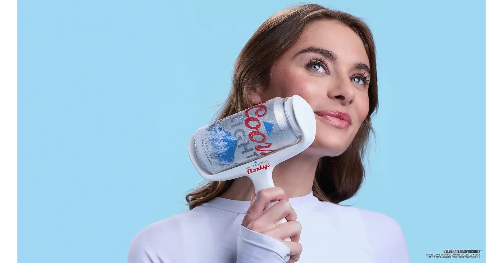Coors Light Chill Face Roller holding a beer can.