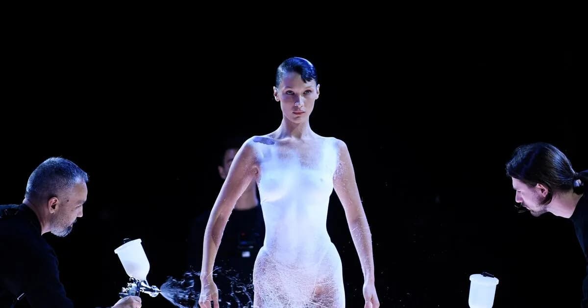Spray-on dress: Bella Hadid is at the Coperni spring-summer 2023 show at Paris Fashion Week. Photograph: Julien de Rosa/AFP via Getty