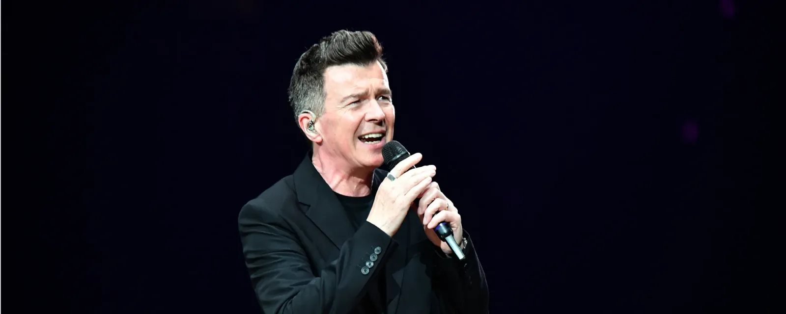 Remember When Rick Astley Recreated the "Never Gonna Give You Up" Video 35 Years After Its Release for an Insurance Company
