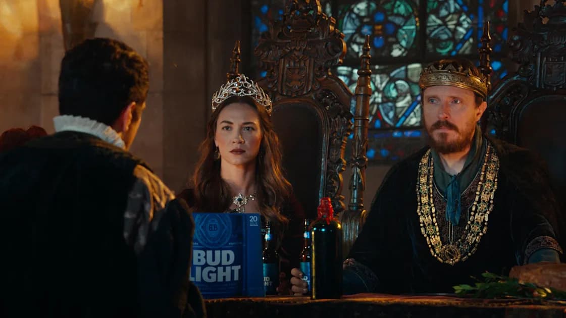 The king and queen received a guest at the medieval Bud Light banquet.