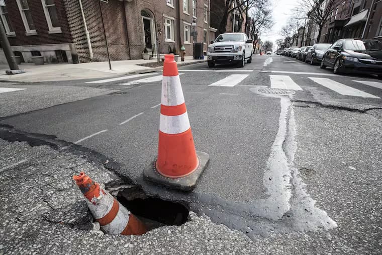 People are asking Domino’s Pizza to fix Philly’s potholes
