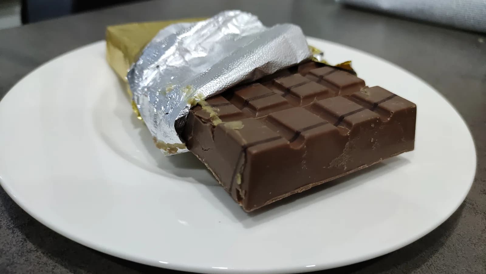 Dubai chocolate broken open on a plate
