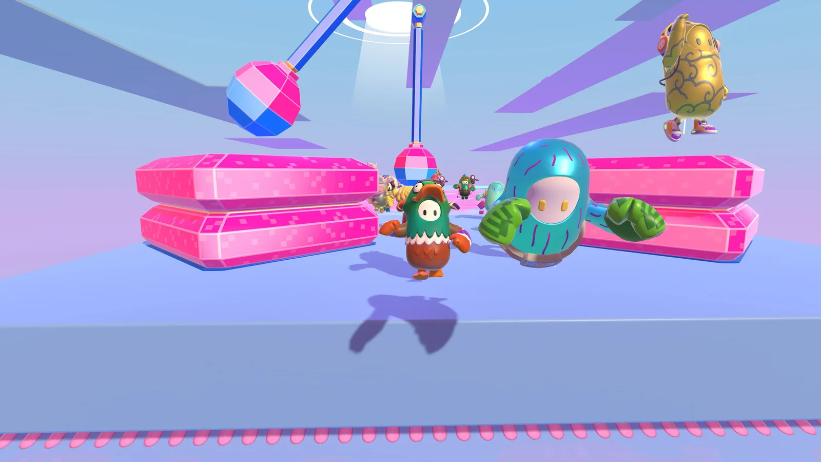 Fall Guys contestants dodging pink obstacles in a gameplay screenshot from the official Steam listing.