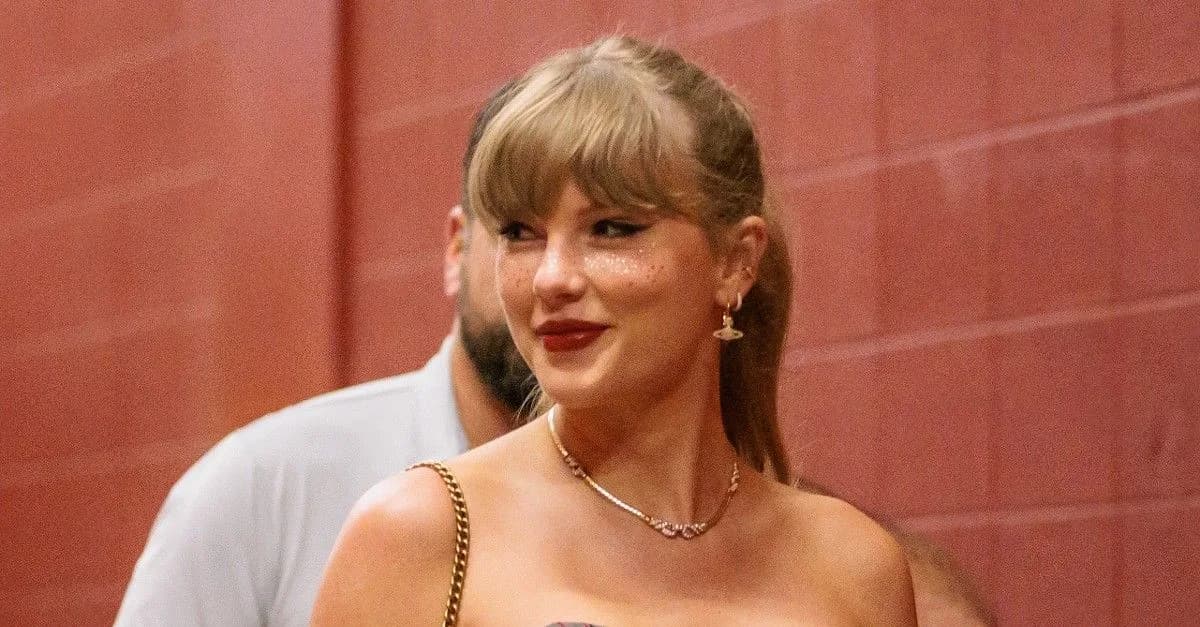 Taylor Swift wearing glitter freckles to the Chiefs game