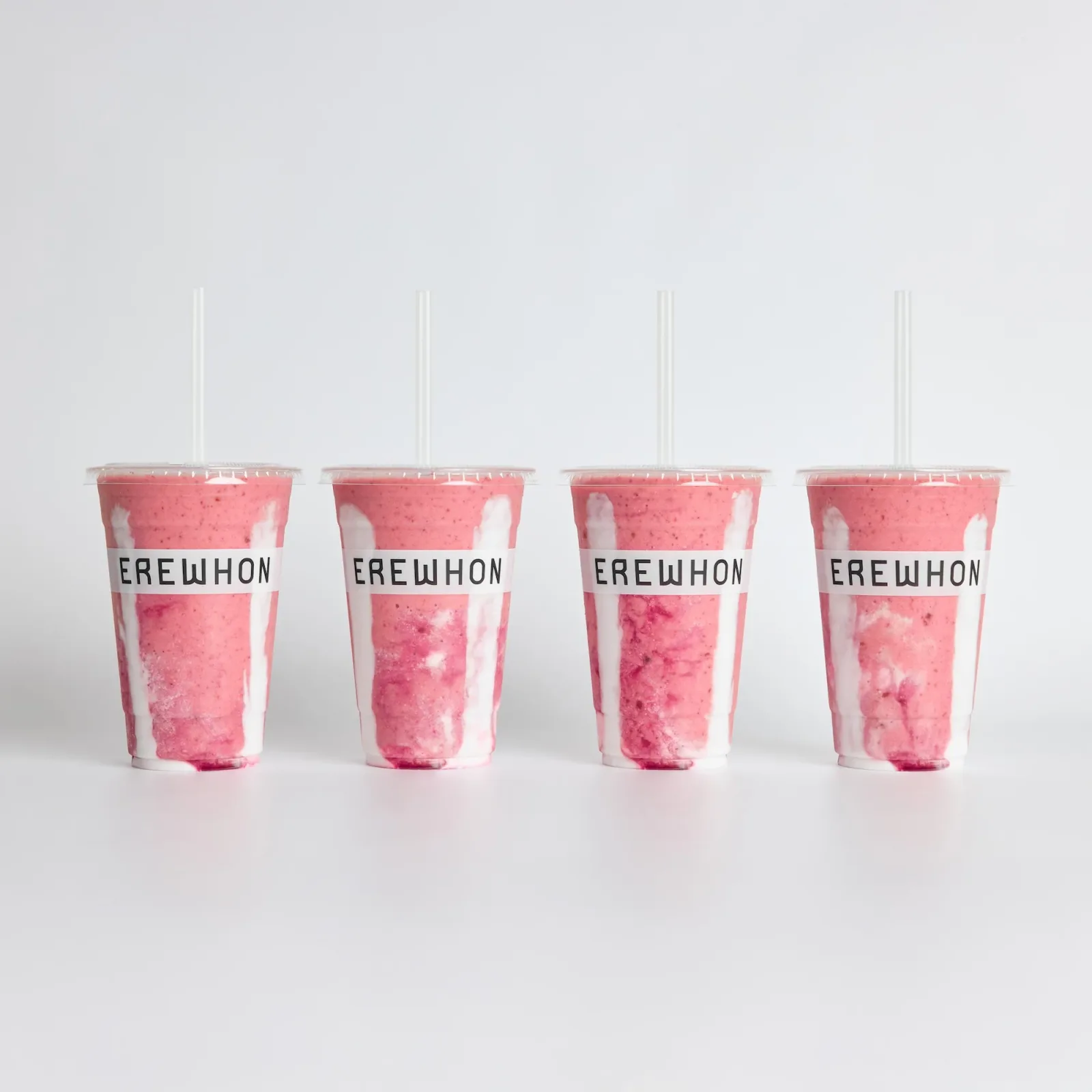 Four Strawberry Glaze Skin Smoothies in Erewhon cups, from the official home kit product page.