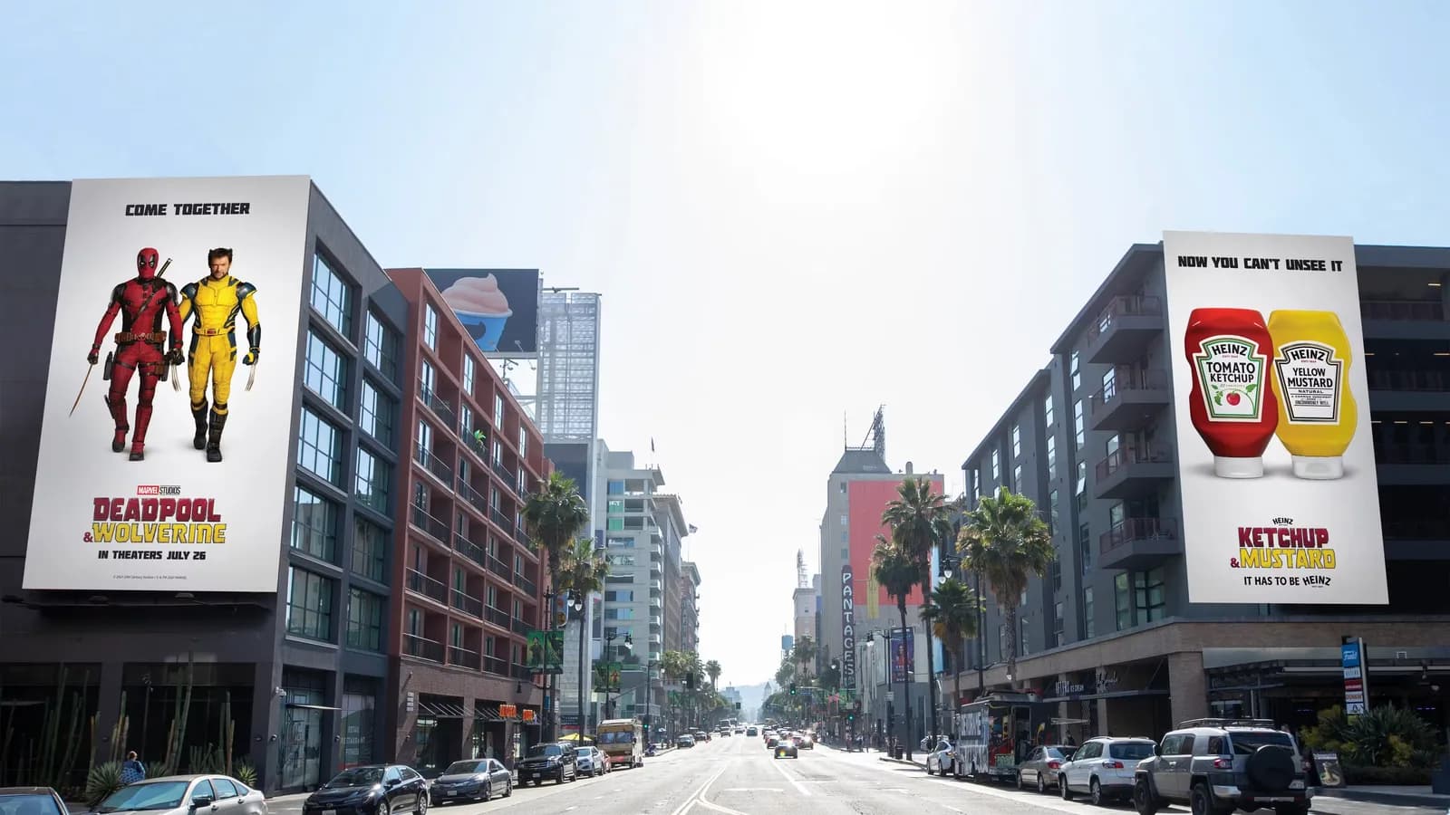 Heinz ketchup-and-mustard billboard opposite a Deadpool & Wolverine billboard