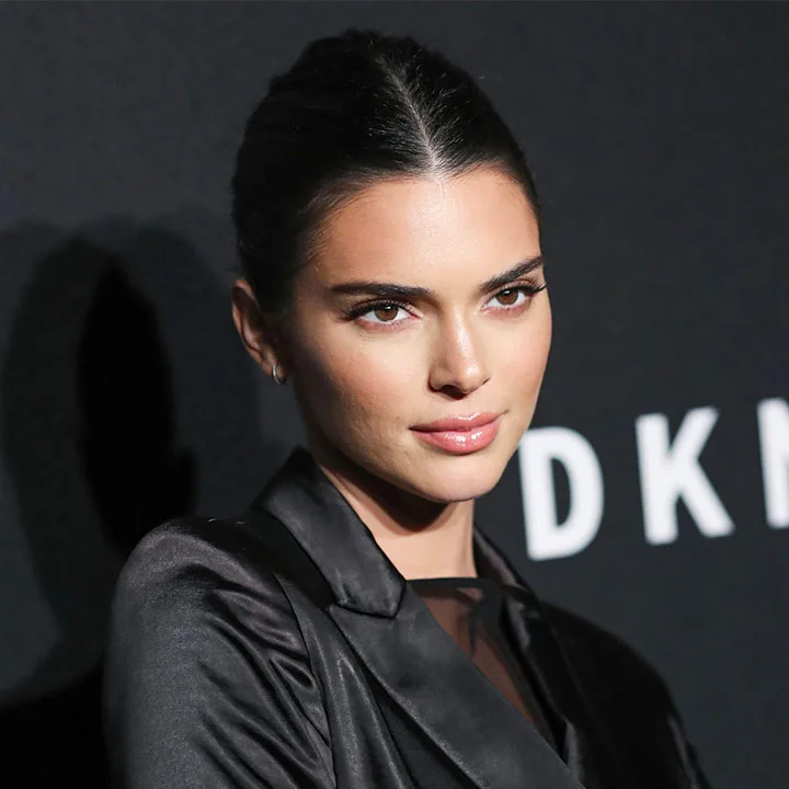 Kendall Jenner Brings Us Back To The 2000s In A Tiny White Tank And Denim Micro Mini— She's Got Legs For Days!