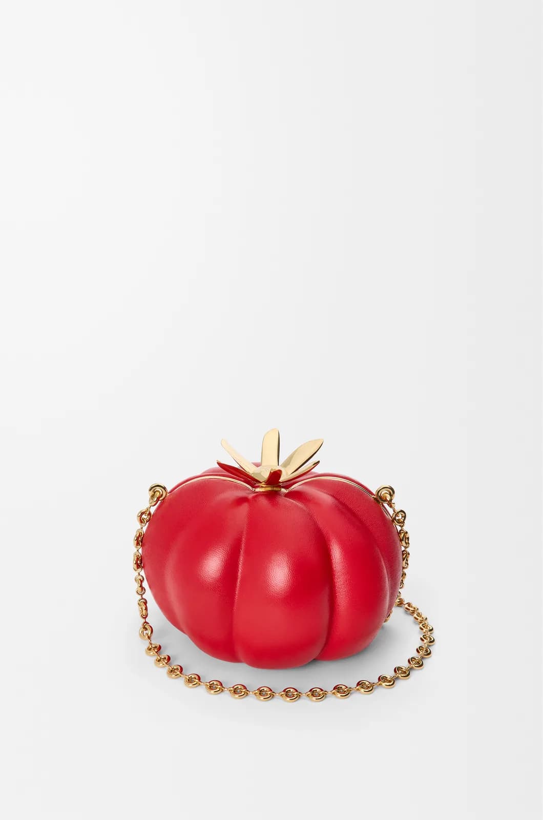 Loewe’s red tomato clutch with gold calyx clasp.