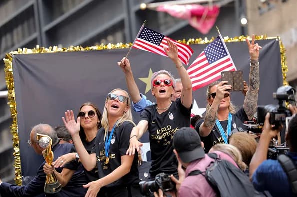 USWNT members Allie Long and Megan Rapinoe strike a pose during the...