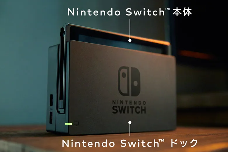 A still from Nintendo’s reveal showed Switch seated in its dock, with Japanese hardware labels.