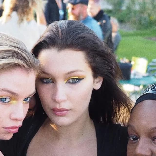 @patmcgrathreal on Instagram: "Golden hour with these golden girls... A selfie moment after applying #Gold001 at @voguemagazine event #pattakesparis ✨✨✨"