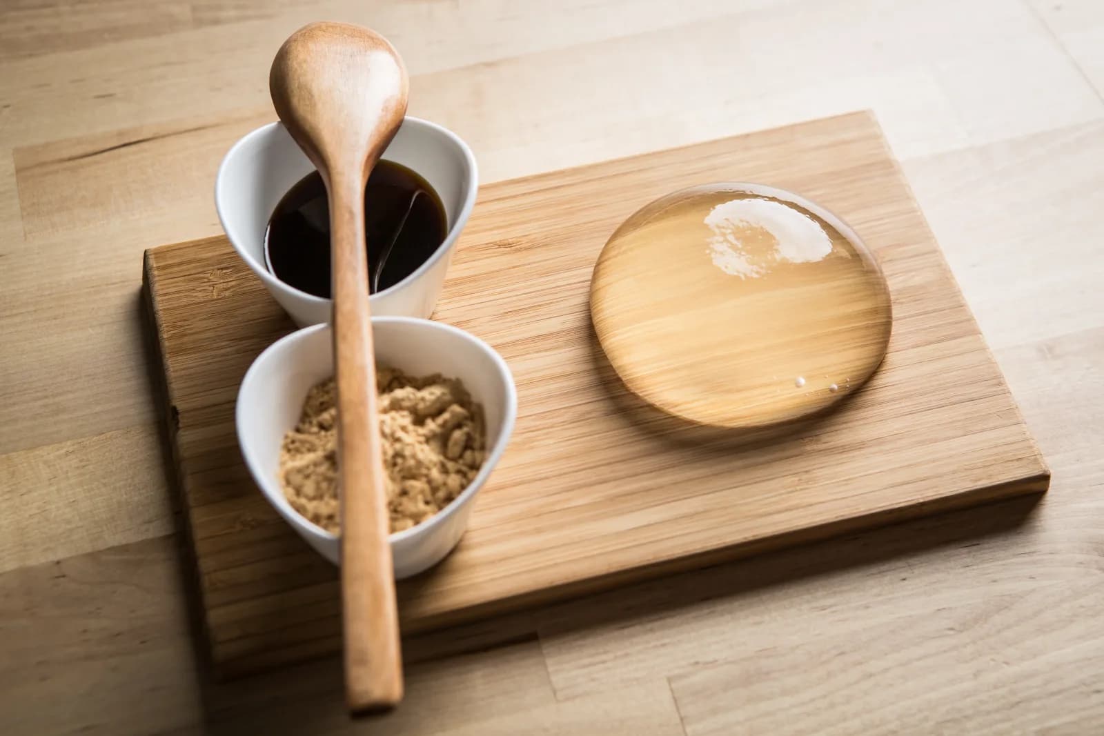 The original Raindrop Cake with black sugar syrup and roasted soy flour.