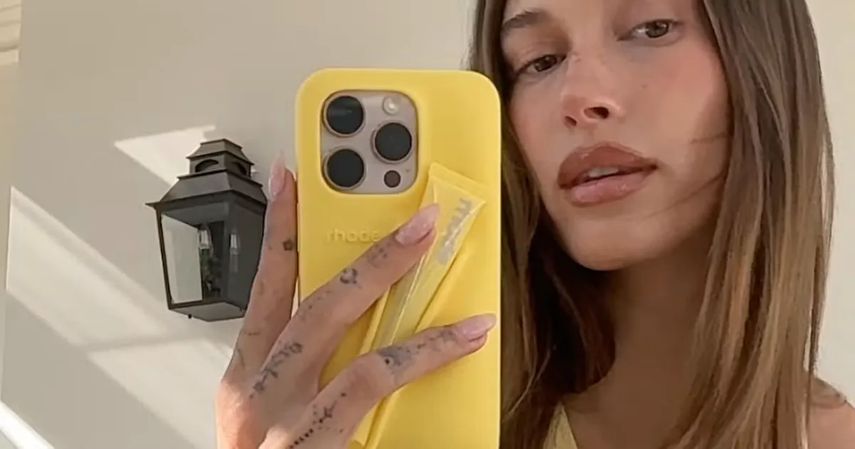 Hailey Bieber Paired A Bikini With A Belly Chain Lip Gloss Carrier & I'm Speechless