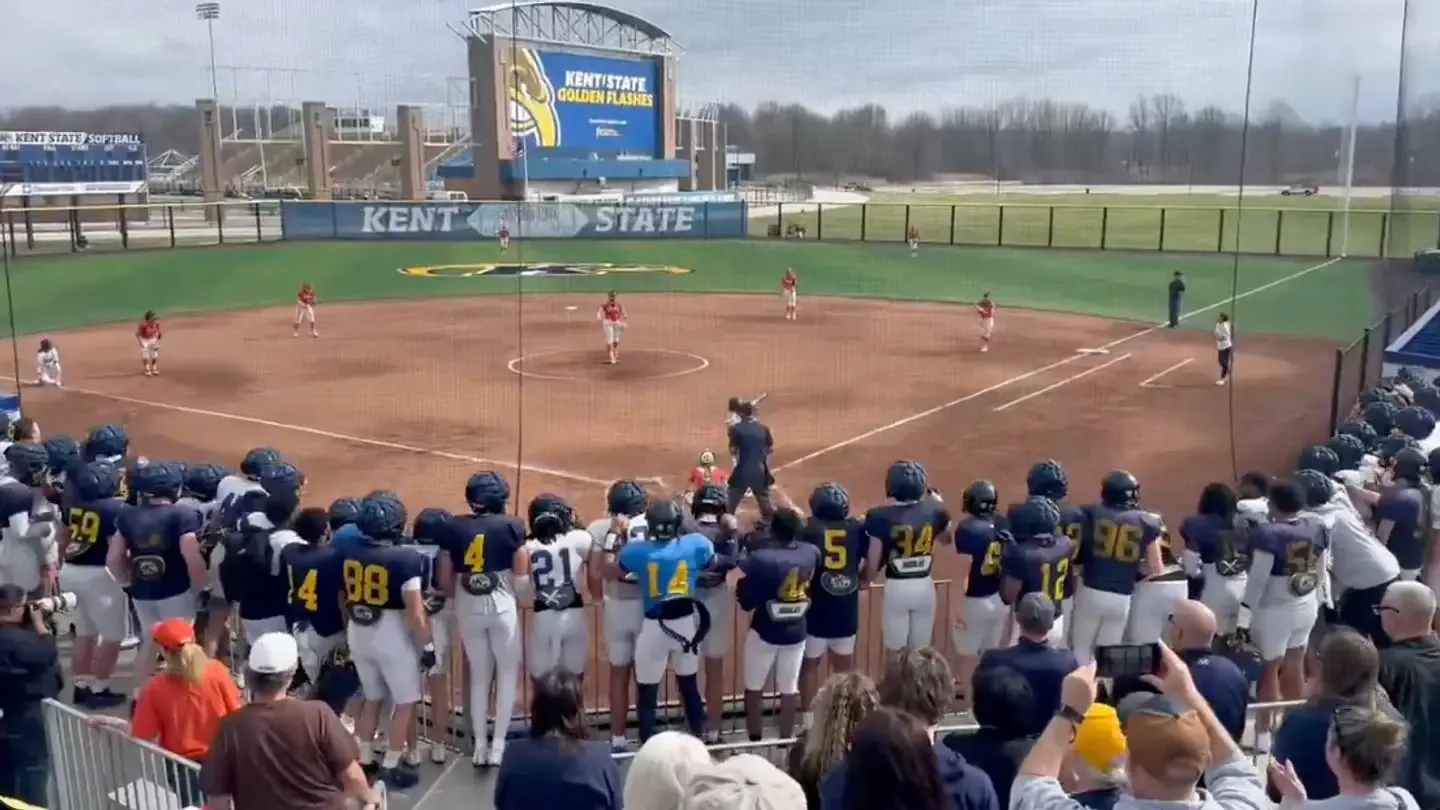 Kent State Football Steals the Show Cheering on Softball in Full Gear