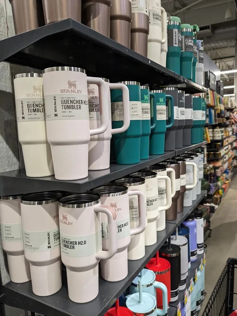 Shelves of Stanley Quencher H2.0 tumblers in a shop