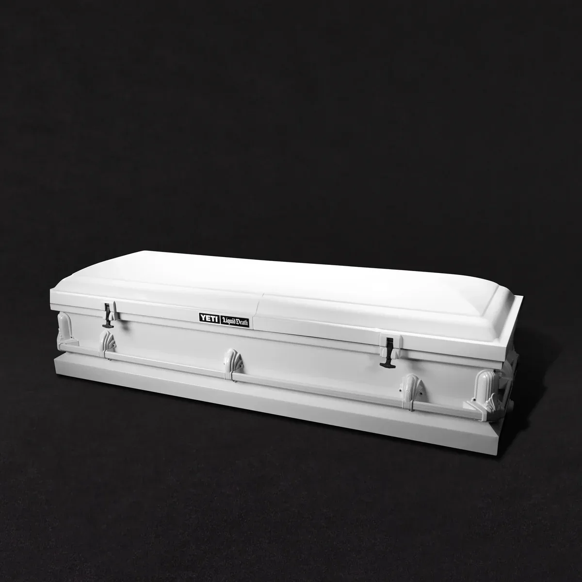 The white life-size Casket Cooler with YETI and Liquid Death branding