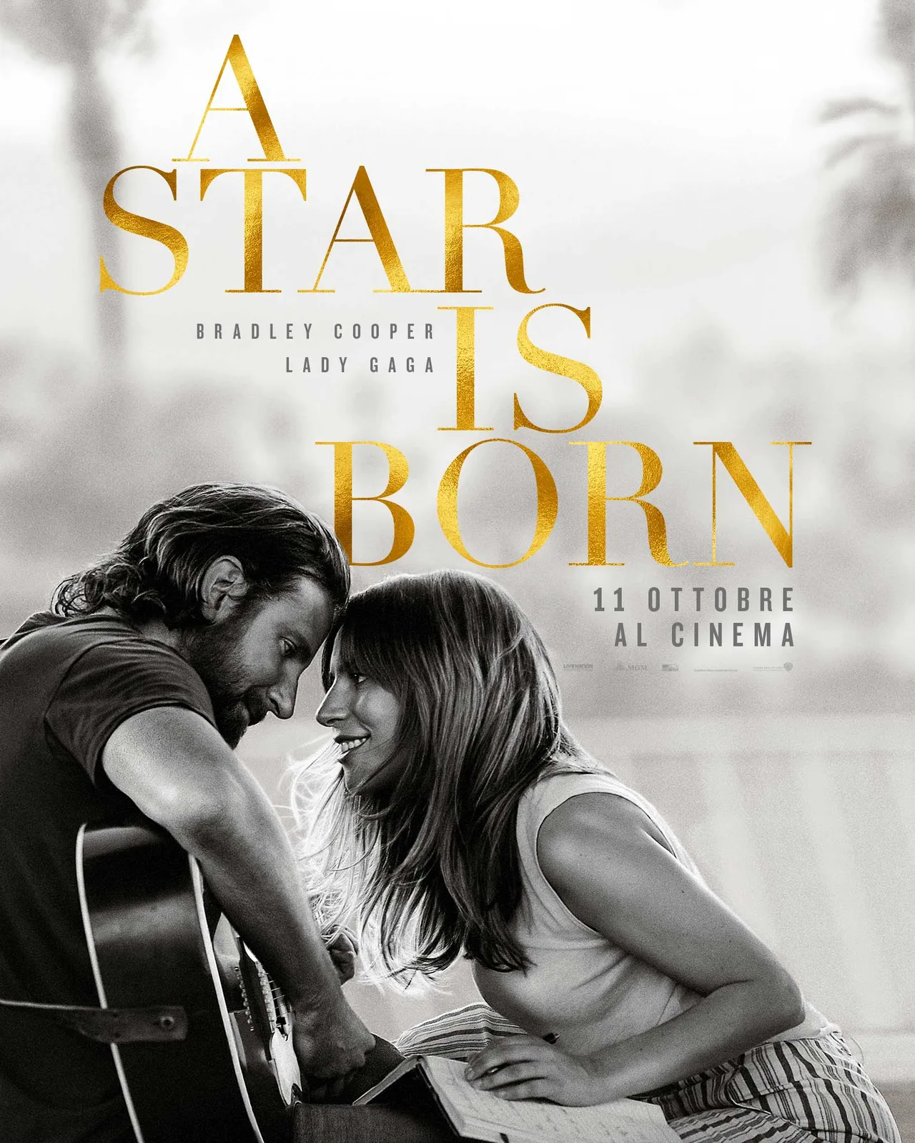 Official Italian poster showing Bradley Cooper and Lady Gaga together.