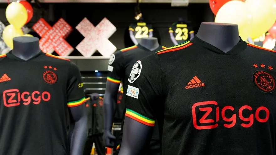 Official shop photograph of the black Ajax Marley kit on mannequins.