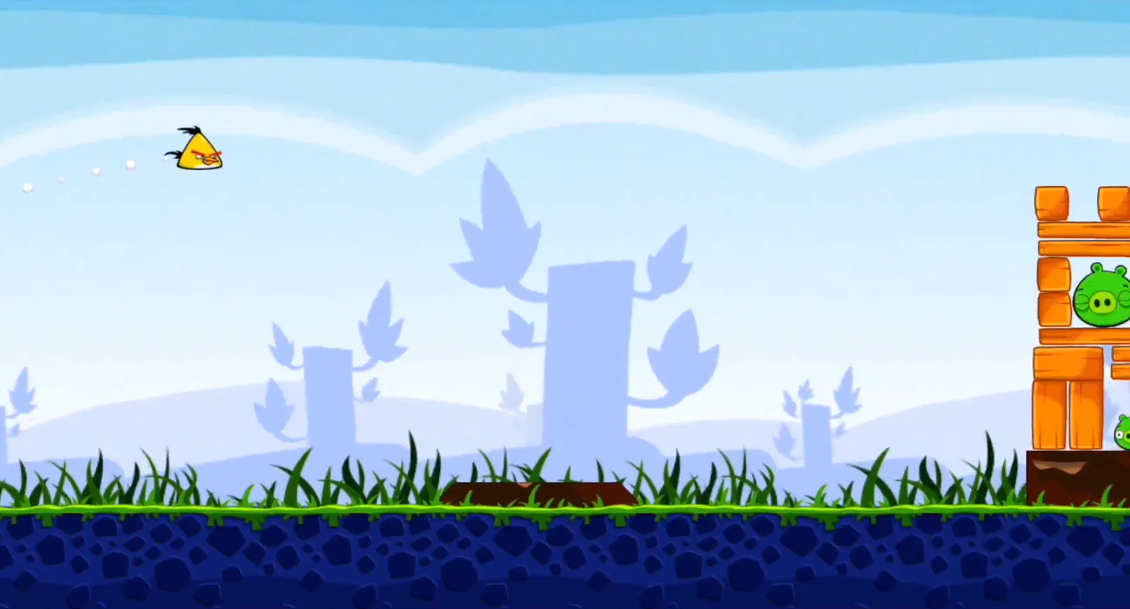 Chuck launched toward a pig structure in the original Angry Birds game. Commons lists CC BY 3.0.
