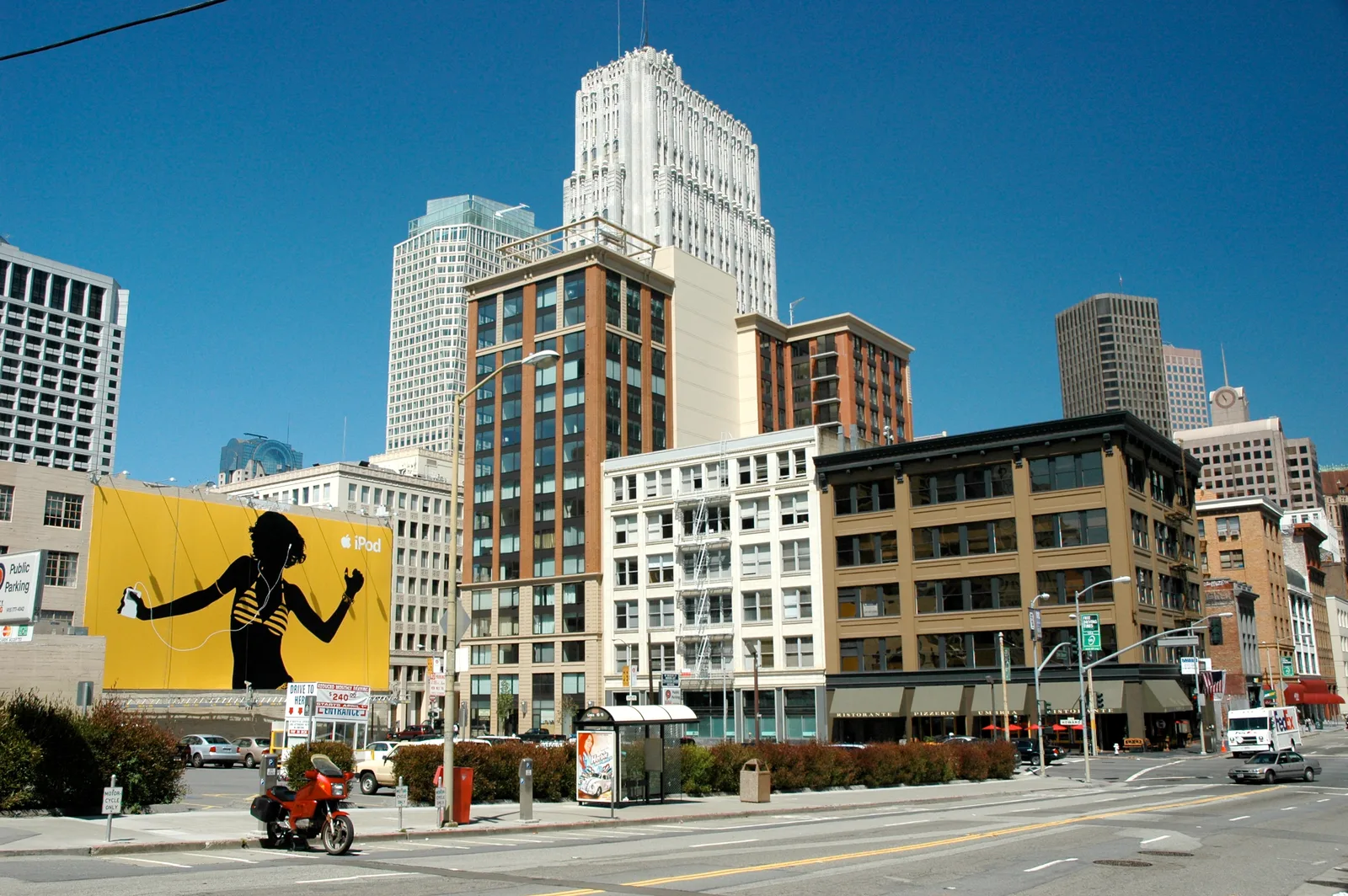 A yellow iPod silhouette billboard in San Francisco, photographed in June 2005; CC BY-SA 2.0.