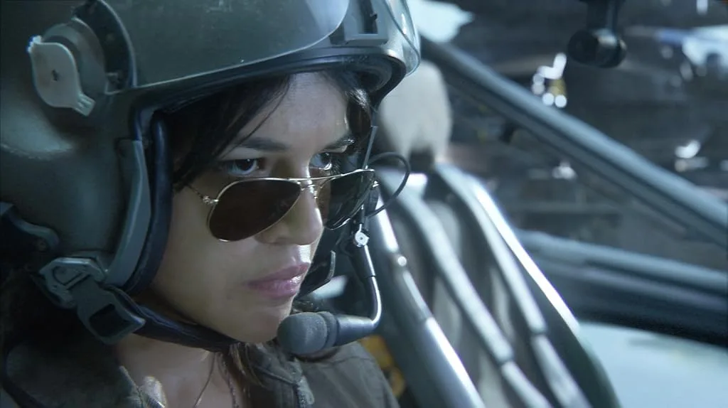 Trudy Chacón at the controls of her helicopter