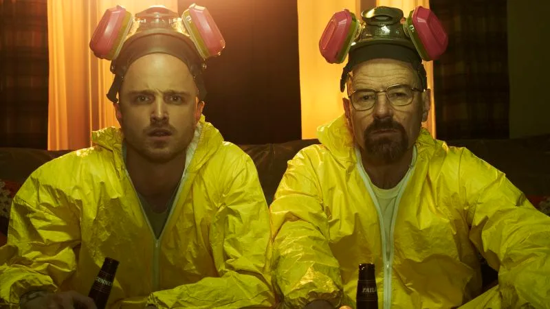 Walter White and Jesse Pinkman in yellow hazmat suits