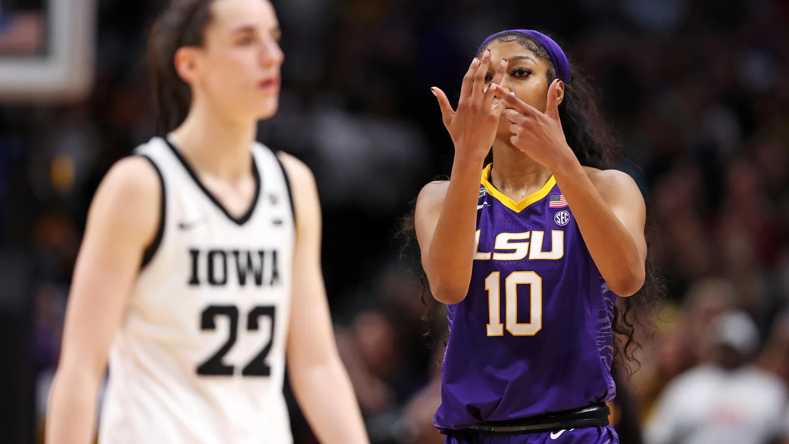 Caitlin Clark and Angel Reese during the 2023 LSU v Iowa final