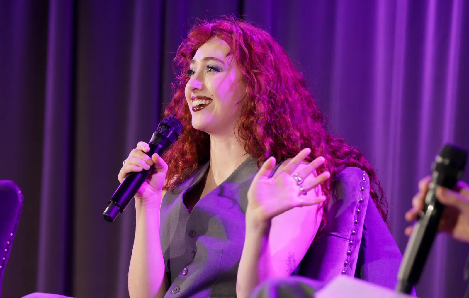 Chappell Roan singing on stage in 2024
