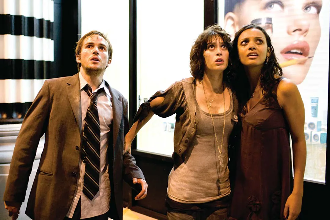 Cloverfield cast looking up in the street