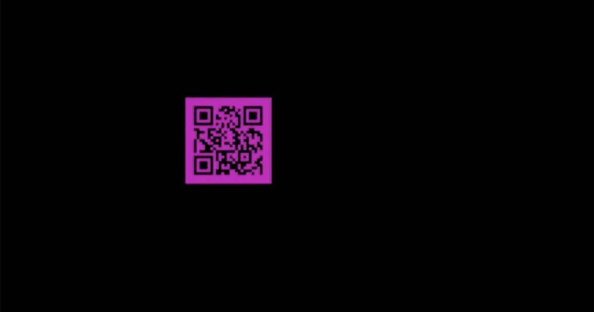 A pink QR code on black from the aired creative, shown in Wavemaker’s campaign case study.