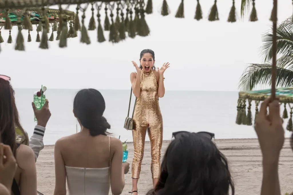 Beach party scene from Crazy Rich Asians.