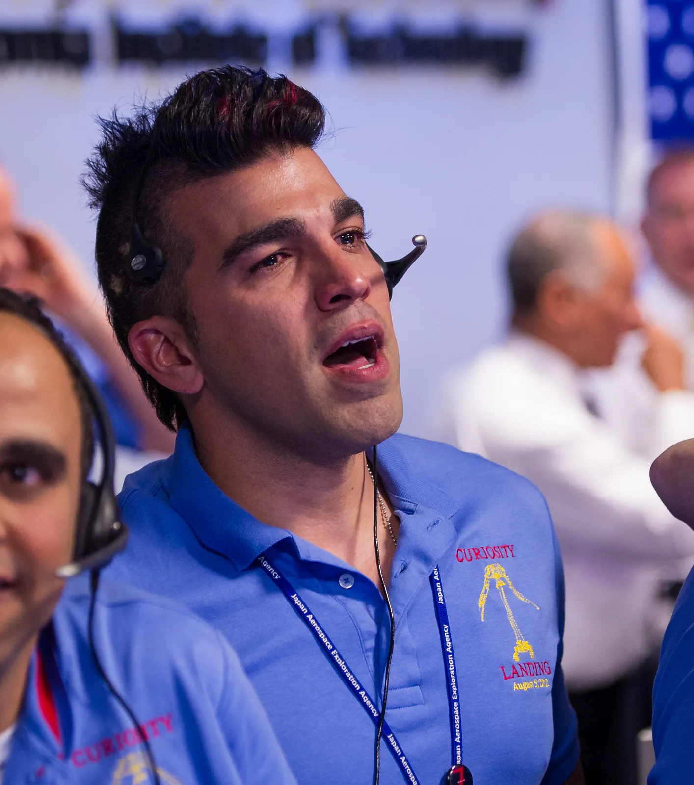 Bobak Ferdowsi reacted to the successful landing at JPL; NASA photograph in the public domain.