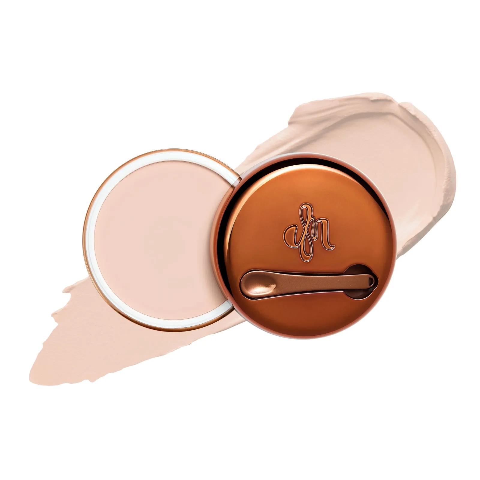 Danessa Myricks Yummy Skin Blurring Balm Powder in its compact with application spatula.