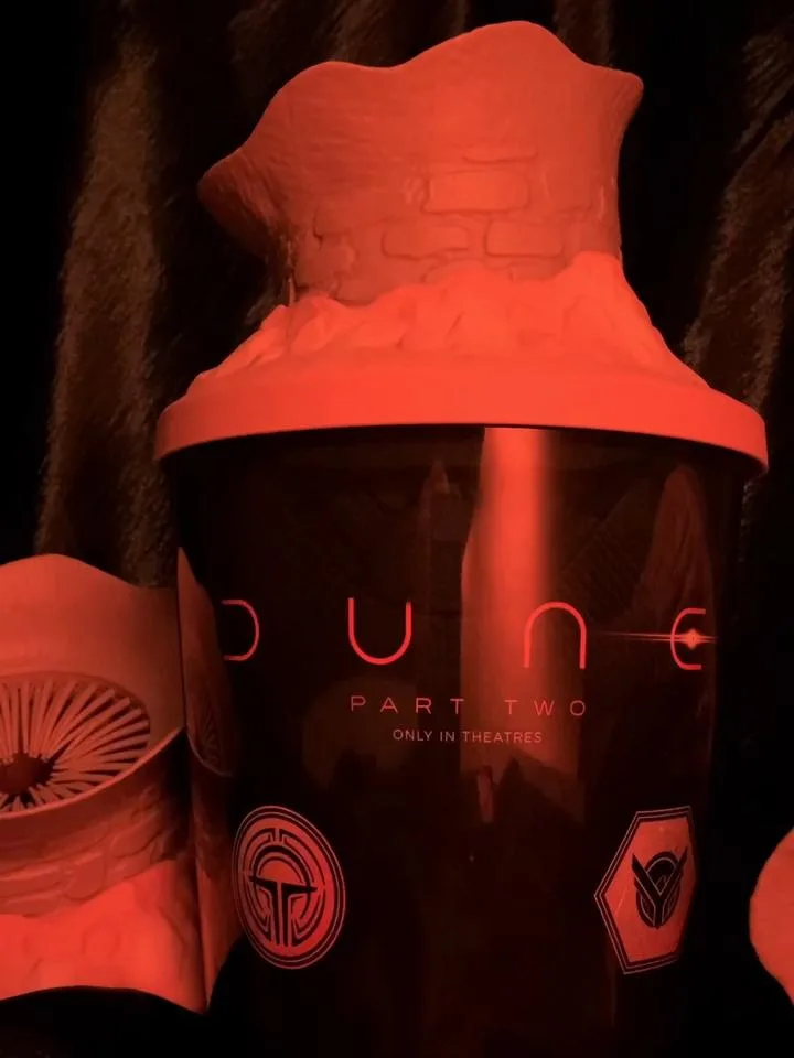 The sandworm lid and Dune: Part Two popcorn tin in AMC’s official TikTok cover image.