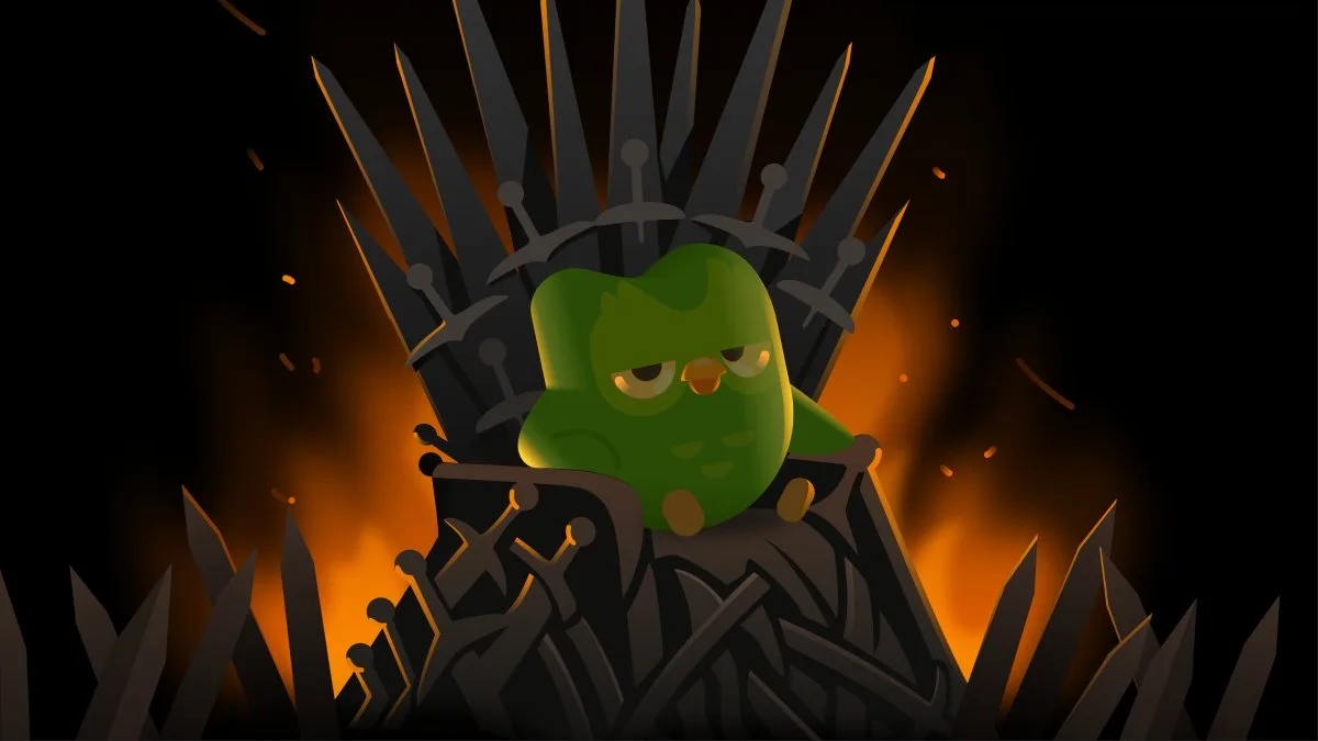 Digital drawing of the Duolingo green owl mascot sitting on a rendition of the Iron Throne from Game of Thrones. Blurred flames can be seen in the background.