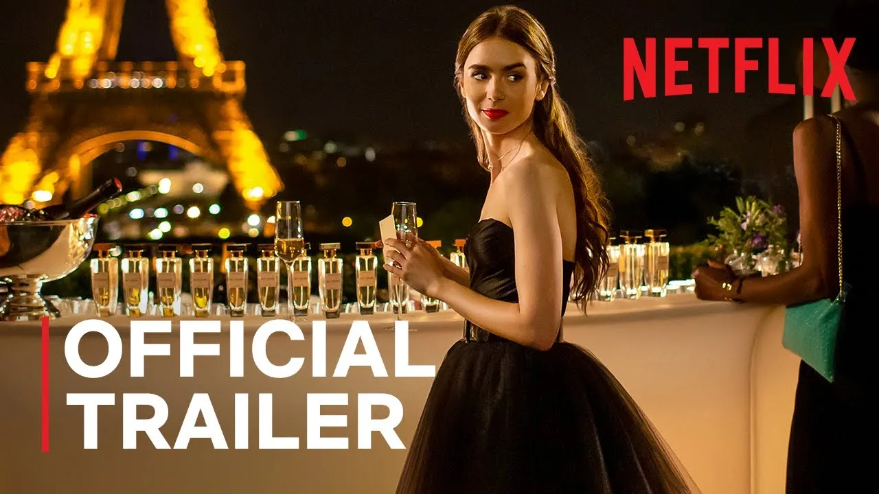 Emily at a party below the Eiffel Tower, from the official trailer.