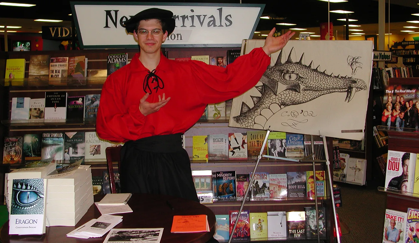 Christopher Paolini in costume at a bookstore event on his self-publishing tour
