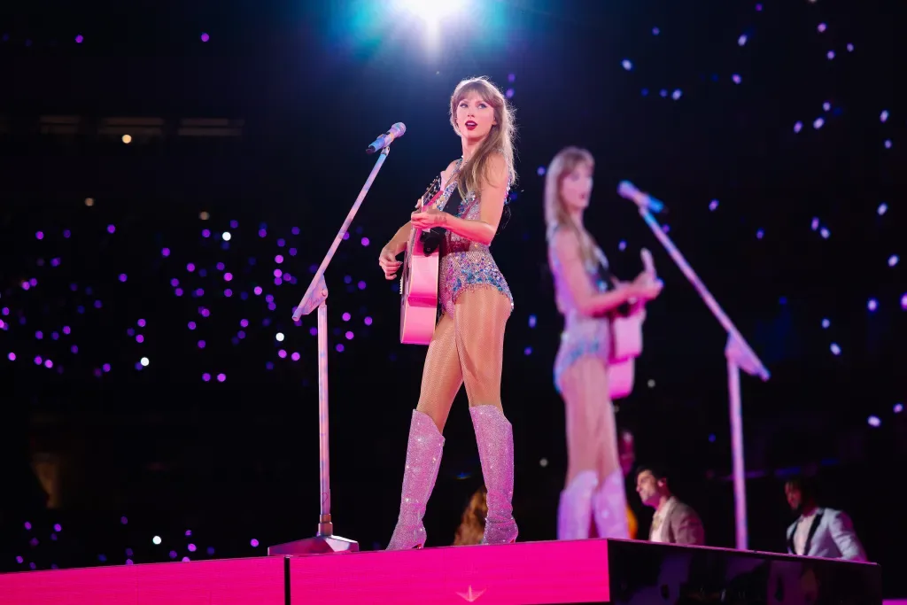Taylor Swift and dancers on stage, from the concert film