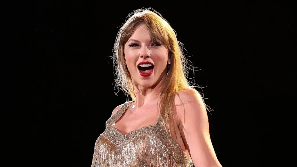Taylor Swift smiling on stage