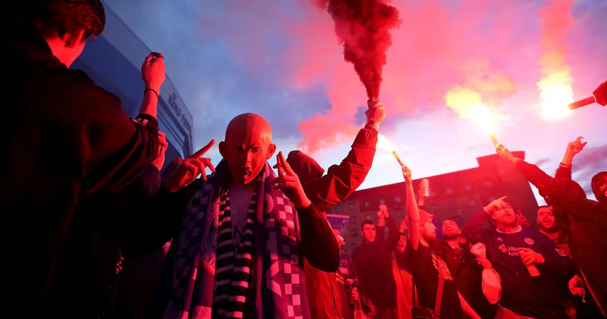 Leicester City fans celebrate victory their FA Cup victory outside the King Power Stadium. PA