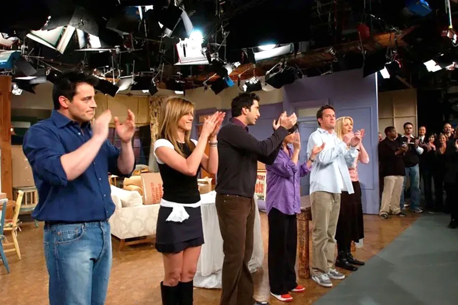 The cast on the Friends set during a studio taping