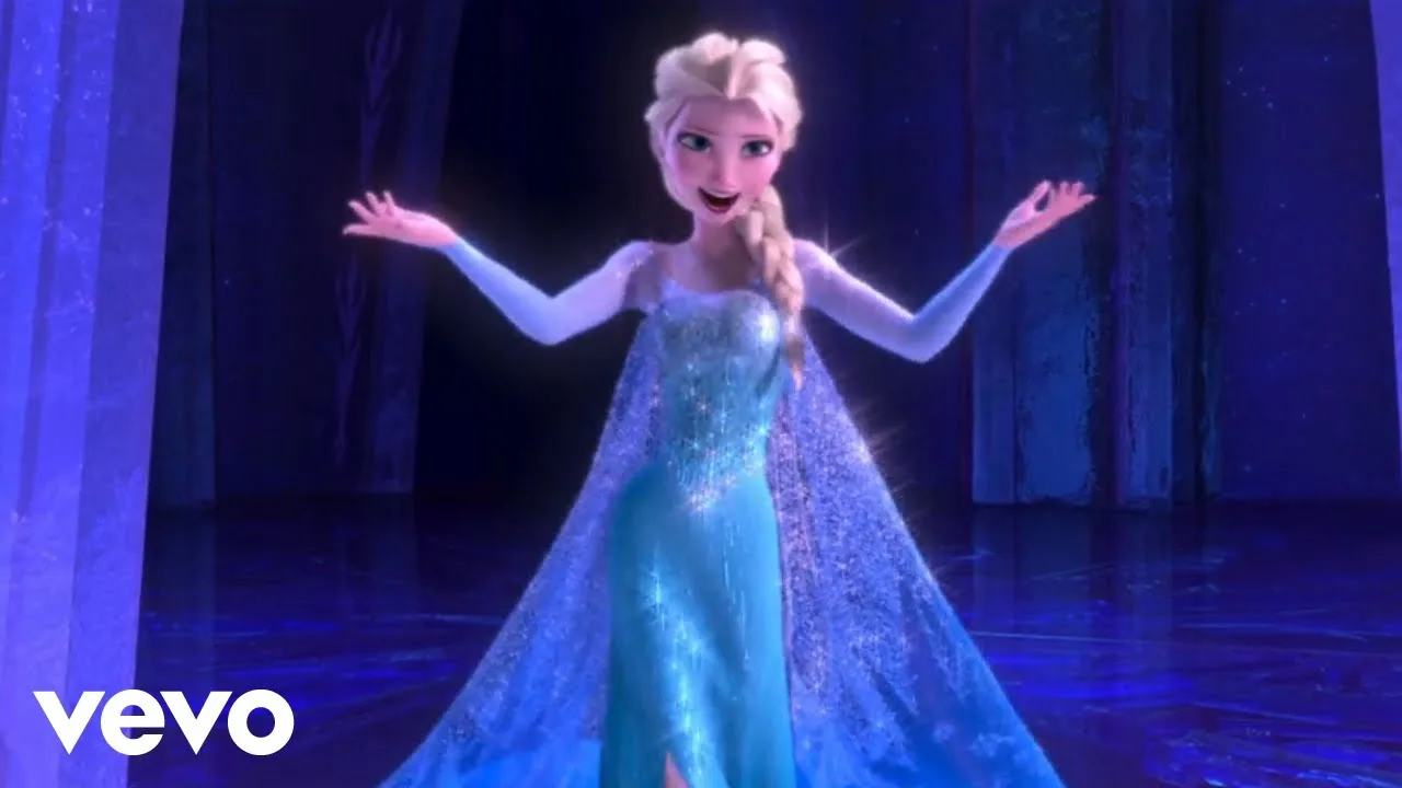 Elsa in the Vevo video for Idina Menzel's 'Let It Go'.
