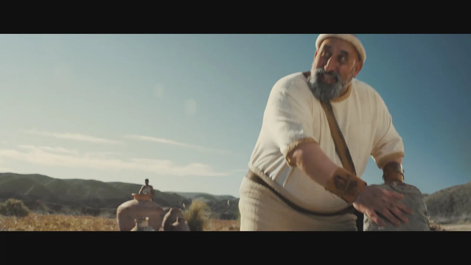 The wheel-invention scene from the FTX creative submitted by dentsuMB and FTX to The One Show.