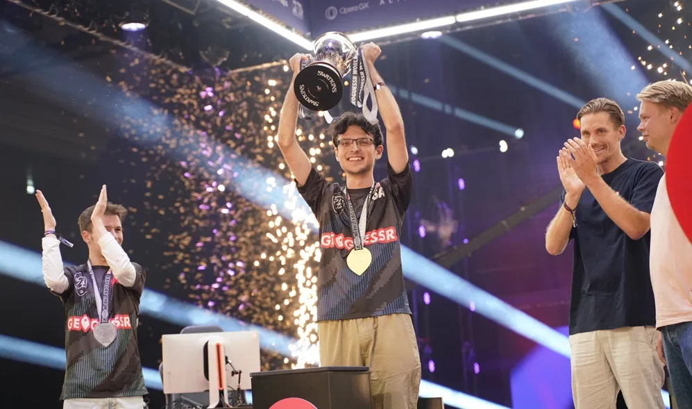 The GeoGuessr World Cup champion lifts the trophy
